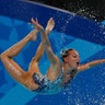 A member of the United States artistic swimming team competes in the free routine final at the Pan American Games in Lima, Peru, July 31, 2019.