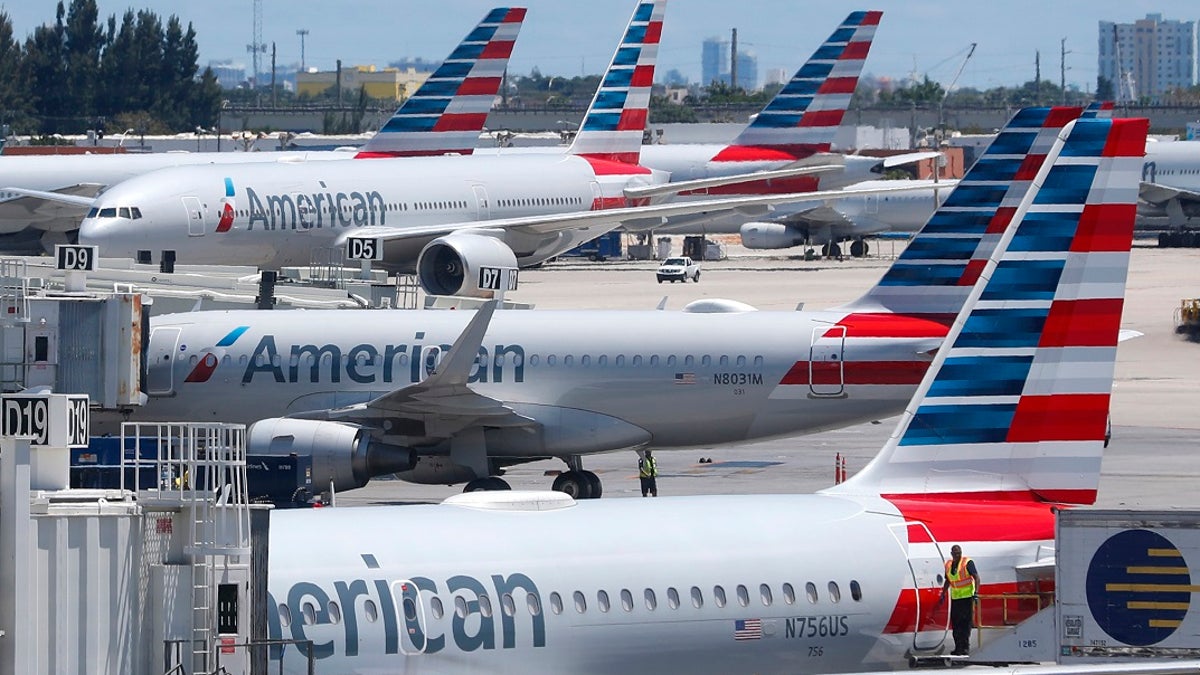 American Airlines aircraft are shown parked at their gates at Miami International Airport in Miami, April 24, 2019. (Associated Press)