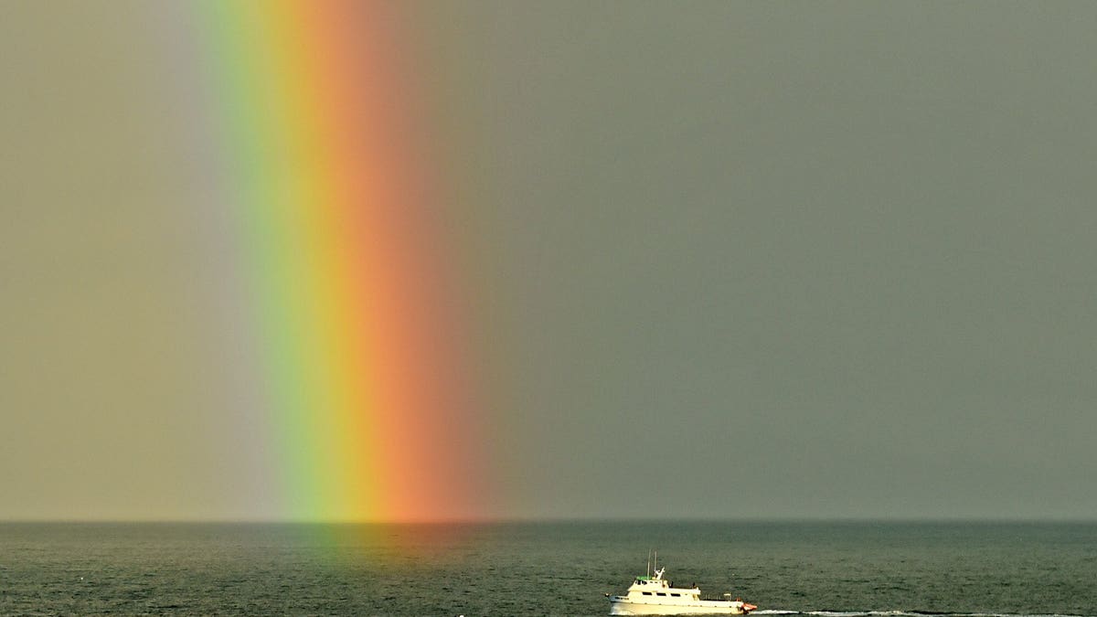 Conception photographed returning to Santa Barbara Harbor on Jan. 12, 2019, with a rainbow from a winter storm as seen from Shoreline Park in Santa Barbara.