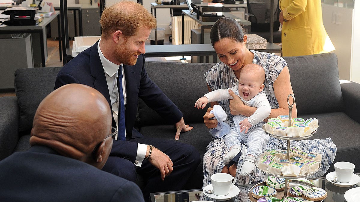 Britain's Duke and Duchess of Sussex, Prince Harry and his wife Meghan Markle hold their baby son Archie as they meet with Archbishop Desmond Tutu at the Tutu Legacy Foundation  in Cape Town on Sep. 25, 2019. The British royal couple are on a 10-day tour of southern Africa -- their first official visit as a family since their son Archie was born in May. Britain's Duke and Duchess of Sussex, Prince Harry and his wife Meghan hold their baby son Archie as they meet with Archbishop Desmond Tutu at the Tutu Legacy Foundation  in Cape Town on September 25, 2019. - The British royal couple are on a 10-day tour of southern Africa -- their first official visit as a family since their son Archie was born in May. (Photo by HENK KRUGER / POOL / AFP)        (Photo credit should read HENK KRUGER/AFP/Getty Images)