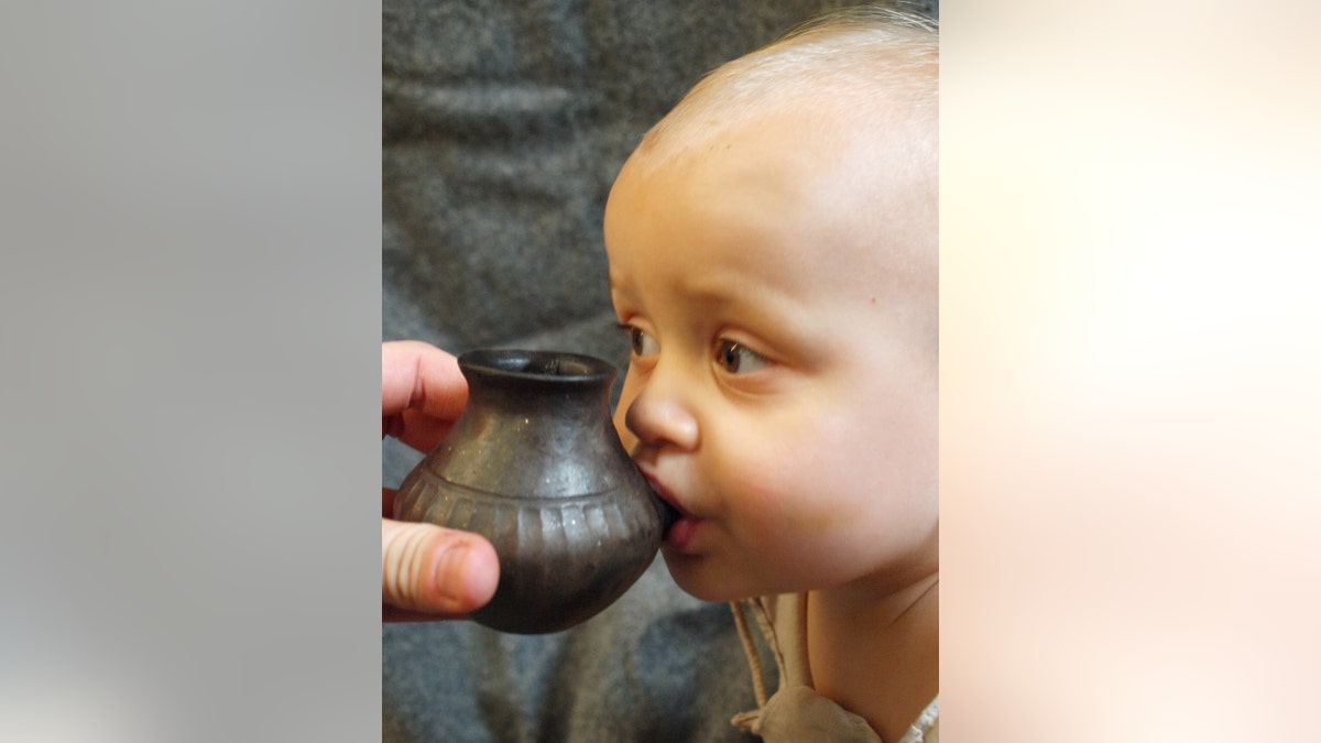The world's first "baby bottle" used by our Bronze Age ancestors more than 3,000 years ago has been unveiled by scientists. (Credit: SWNS)