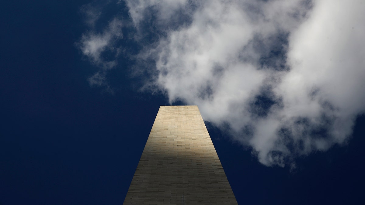 Clouds roll over the Washington Monument, as seen from the foot of the monument, during a press preview tour ahead of its official reopening, Wednesday, Sept. 18, 2019, in Washington. The monument, which has been closed to the public since August 2016, is scheduled to re-open Thursday, Sept. 19. (AP Photo/Patrick Semansky)