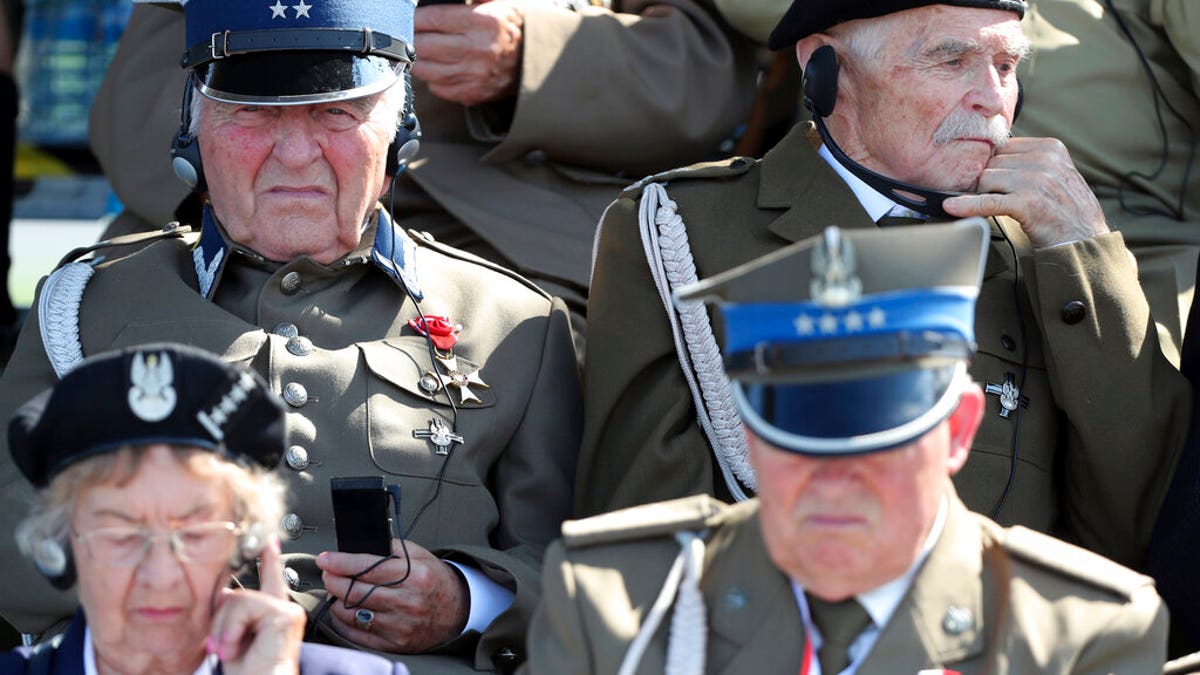 Polish war veterans attend a memorial ceremony marking the 80th anniversary of the start of World War II in Warsaw, Poland, Sunday, Sept. 1, 2019.(AP Photo/Czarek Sokolowski)