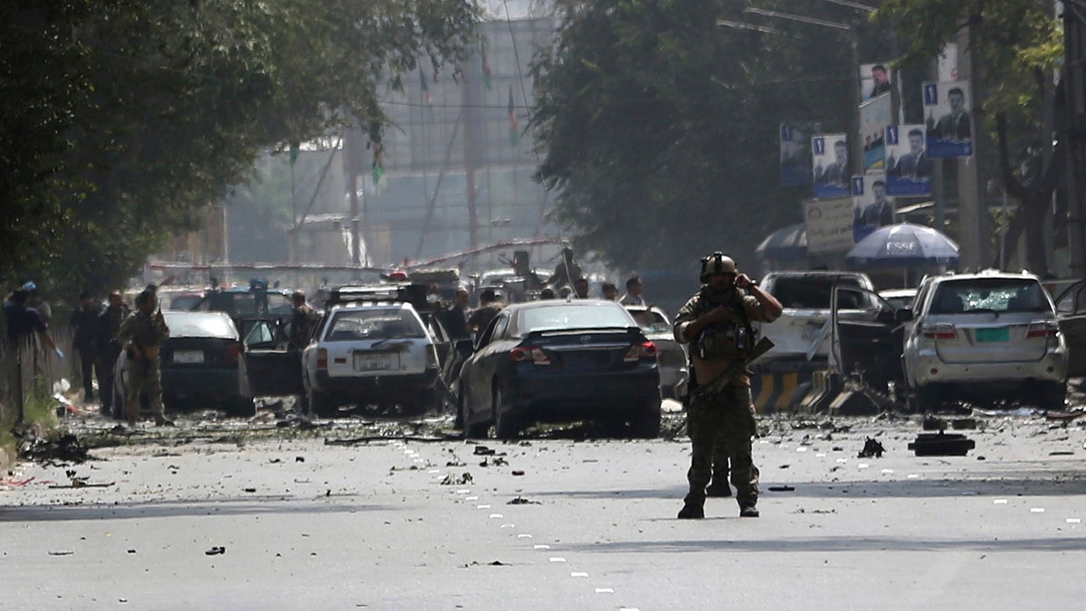 Afghan security personnel arrive at the site of car bomb explosion in Kabul, Afghanistan, Thursday, Sept. 5, 2019. 