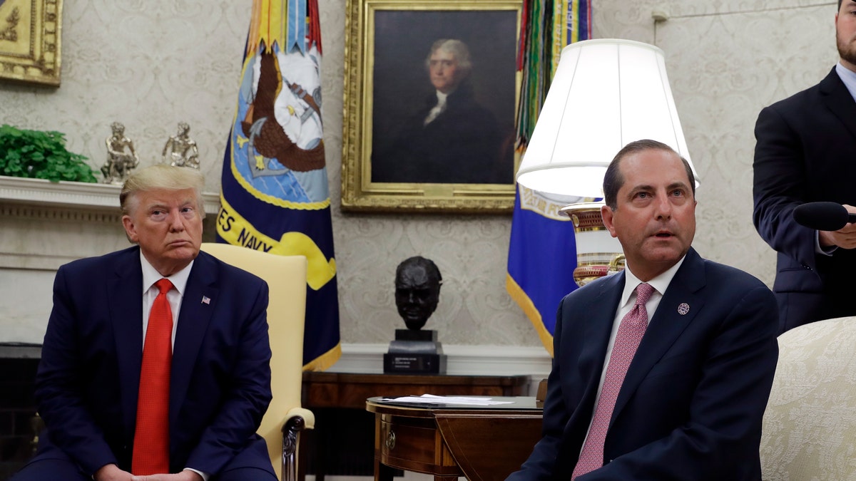 President Trump and Health and Human Services Secretary Alex Azar talk to the media in the Oval Office, Wednesday, Sept. 11, 2019, at the White House in Washington.  (AP Photo/Evan Vucci)