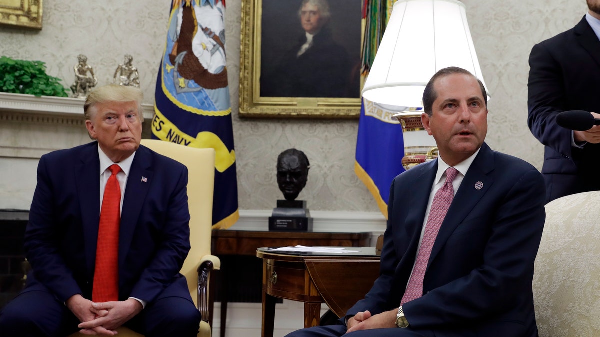 President Trump and Health and Human Services Secretary Alex Azar talk to the media in the Oval Office, Wednesday, Sept. 11, 2019, at the White House in Washington. (AP Photo/Evan Vucci)