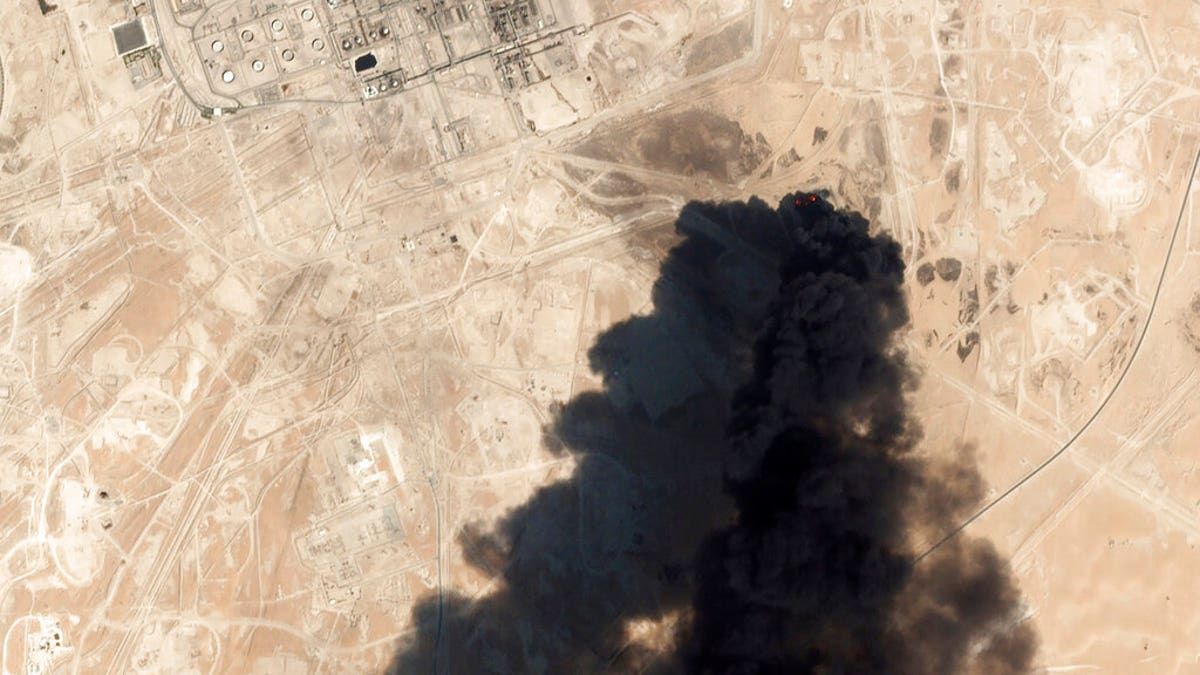 This Saturday satellite image showed thick black smoke rising from Saudi Aramco's Abqaiq oil processing facility in Buqyaq, Saudi Arabia. 
