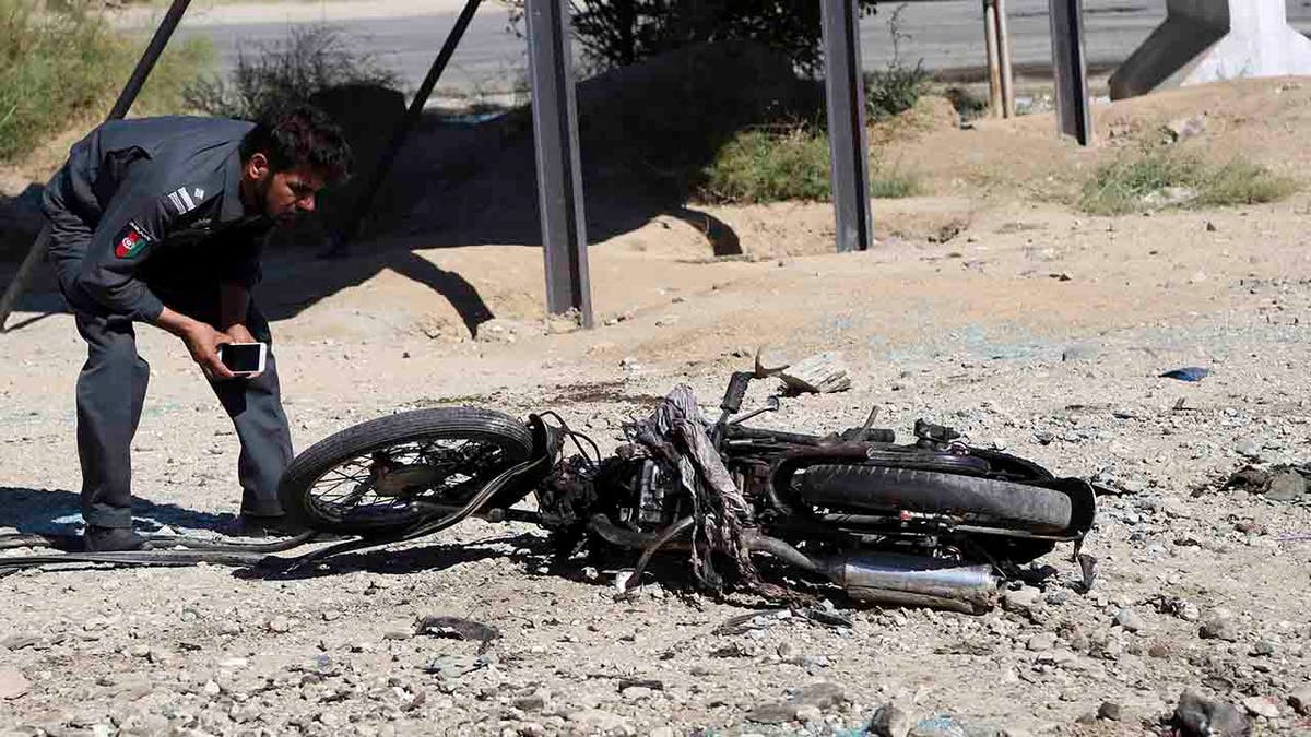 The Taliban suicide bomber on a motorcycle targeted presidential guards who were protecting President Ashraf Ghani at a campaign rally in northern Afghanistan on Tuesday, killing over 20 people and wounding over 30.