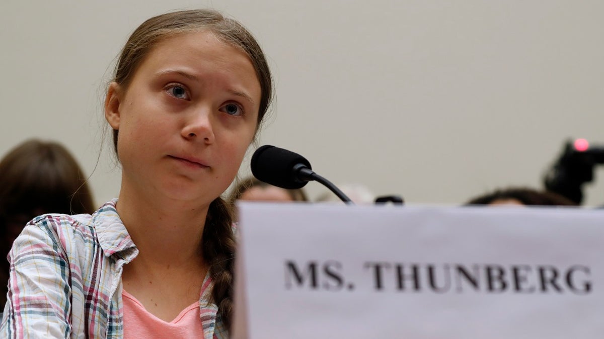 Youth climate change activist Greta Thunberg, left, speaking at a House Foreign Affairs Committee subcommittee hearing on climate change Wednesday. (AP Photo/Jacquelyn Martin)