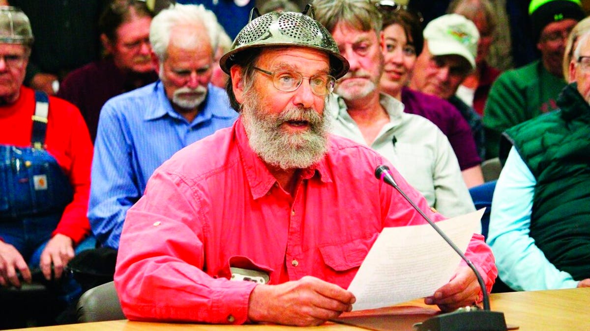 Fritz Creek area resident Barrett Fletcher gives the invocation before a Kenai Peninsula Borough Assembly meeting as a representative of the Church of the Flying Spaghetti Monster at Homer City Hall in Homer, Alaska.