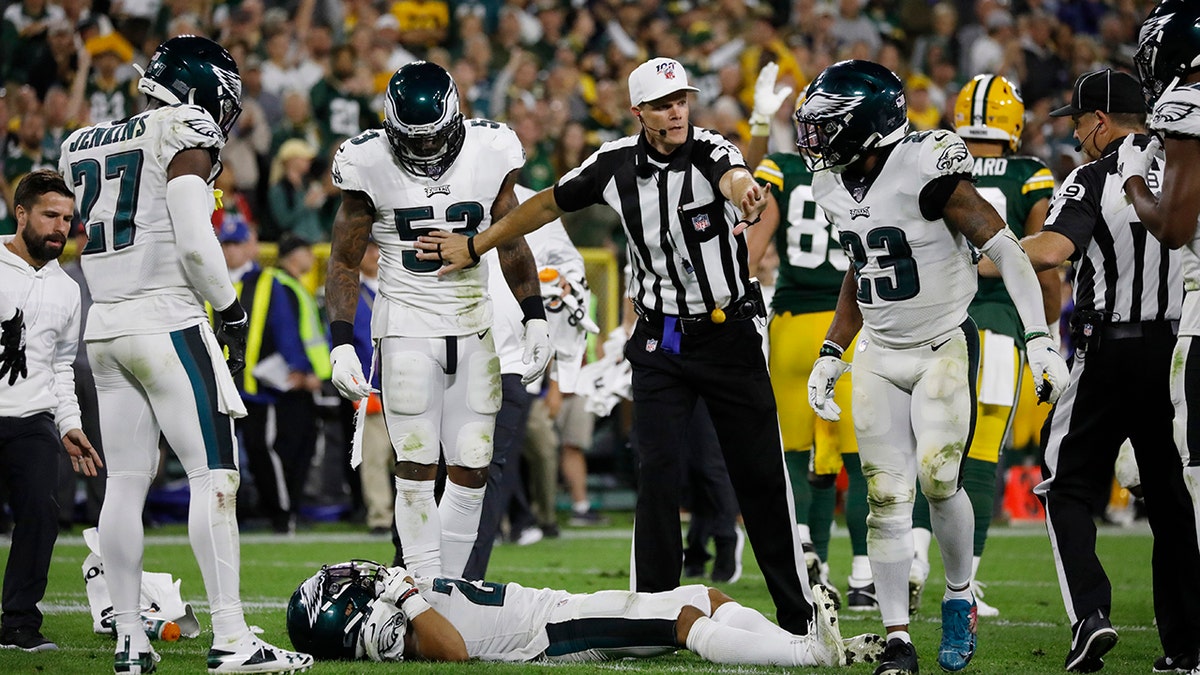 Philadelphia Eagles cornerback Avonte Maddox lies injured on the field during the second half of the team's NFL football game against the Green Bay Packers on Thursday, Sept. 26, 2019, in Green Bay, Wis. Philadelphia won 34-27. (AP Photo/Jeffrey Phelps)