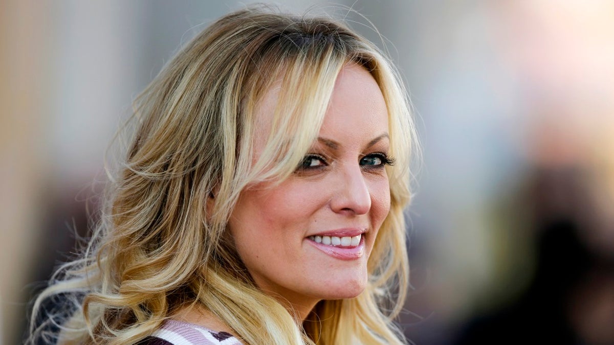 Adult film actress Stormy Daniels attends the opening of an adult entertainment fair in Berlin last year. (AP Photo/Markus Schreiber, File)