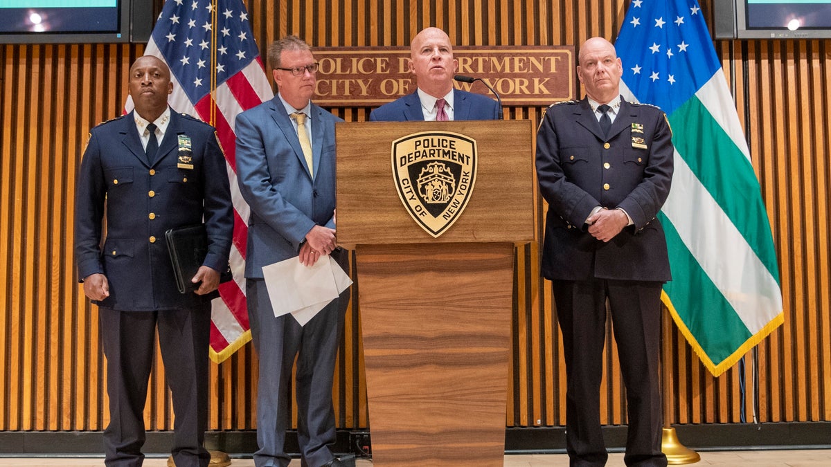 New York City Police Commissioner James O'Neill, center, and others at a news conference on Monday about the death. (AP Photo/Mary Altaffer)