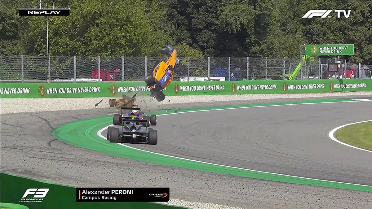 The vehicle of Alex Peroni, 19, was launched into the air after he hit a curb during a race in Monza, Italy. He suffered a fractured vertebra.