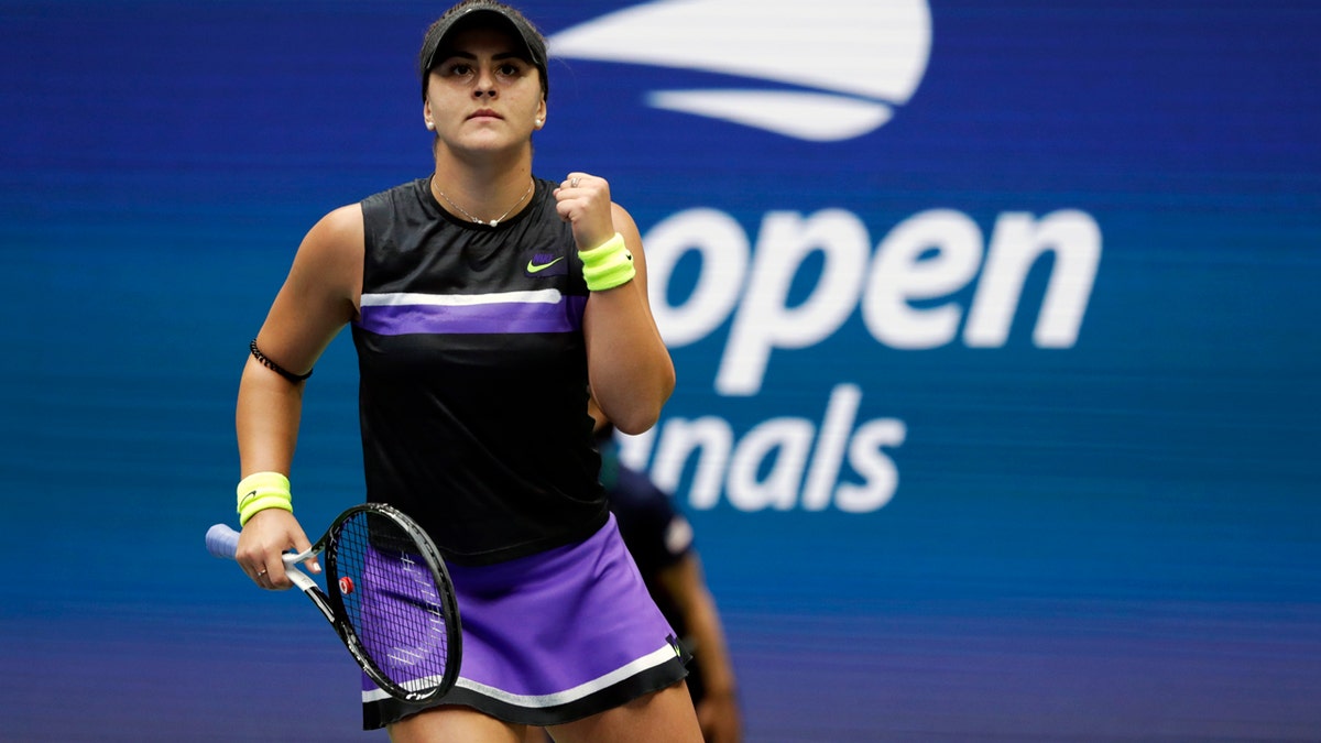 Bianca Andreescu, of Canada, reacts after scoring a point against Serena Williams, of the United States, during the women's singles final of the U.S. Open tennis championships Saturday, Sept. 7, 2019, in New York. (AP Photo/Adam Hunger)