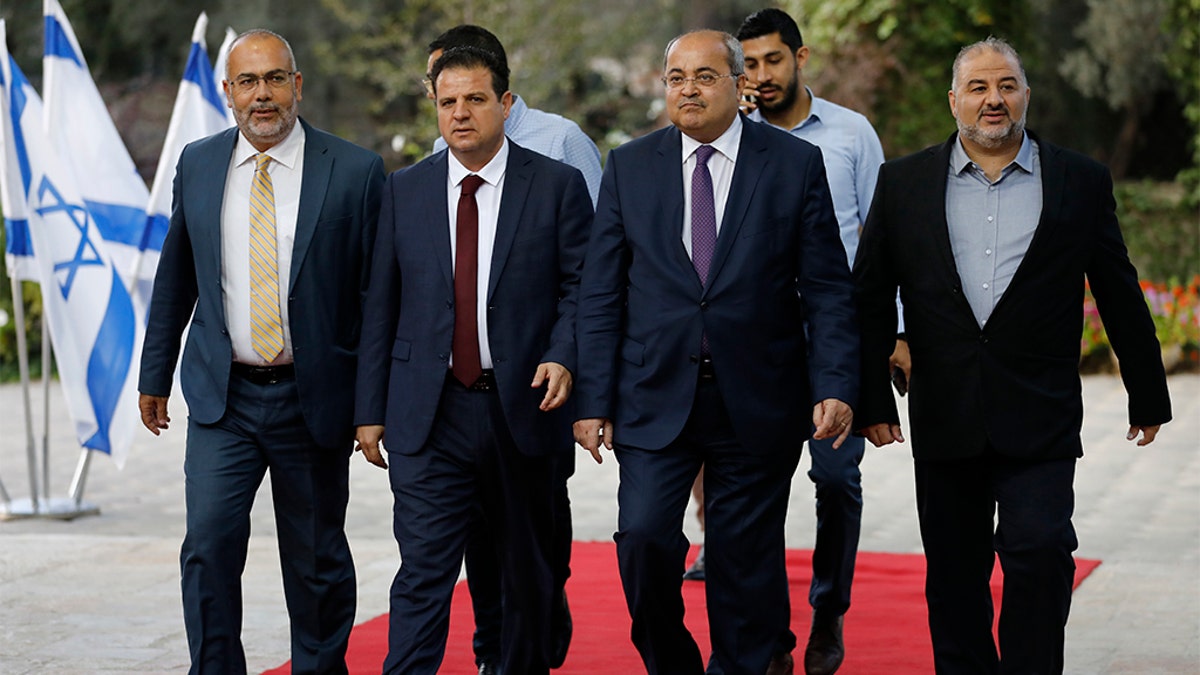 Members of the Joint List, from left to right, Osama Saadi, Ayman Odeh, Ahmad Tibi and Mansour Abbas in Jerusalem on Sunday.