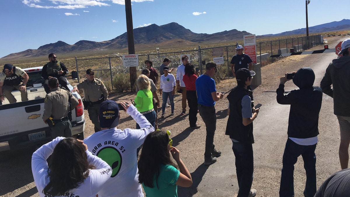 Officials said about 300 additional officers were brought in as hundreds visited the back gate of Area 51 during "Storm Area 51" weekend in rural Nevada