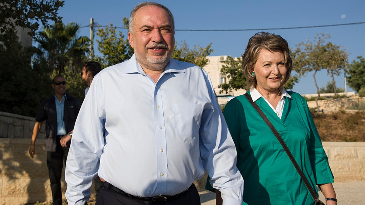 Avigdor Liberman, seen here with his wife, Ella, positioned himself as the primary power broker.