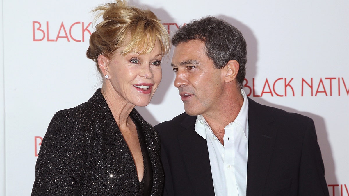 Actors Melanie Griffith and Antonio Banderas attend the "Black Nativity" premiere at The Apollo Theater on November 18, 2013 in New York City. 