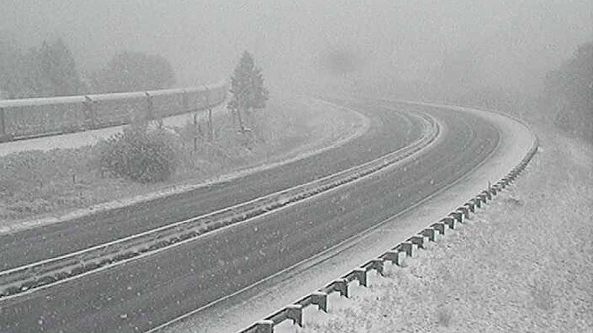 Wintry conditions were impacting Interstate 90 near Bearmouth, Mont. on Sunday.