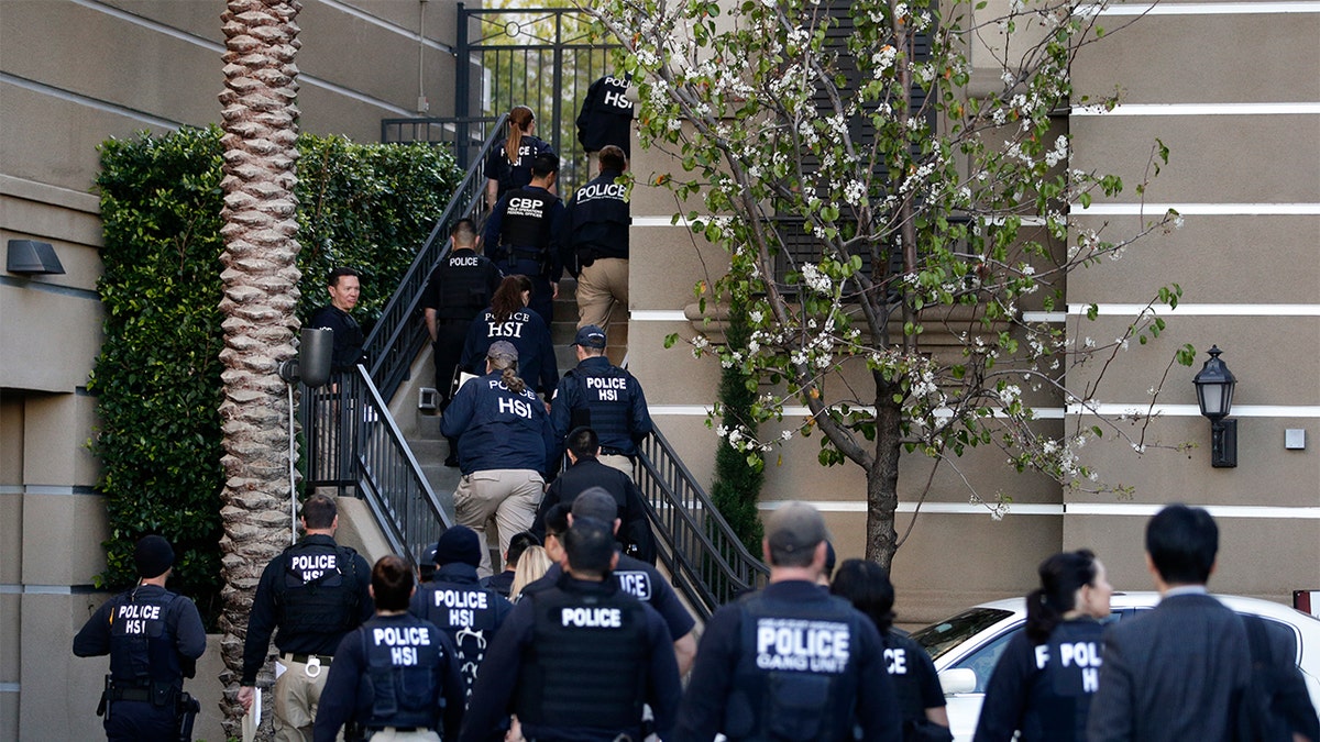 Federal agents conducting a crackdown on alleged maternity tourism rings in 2015.