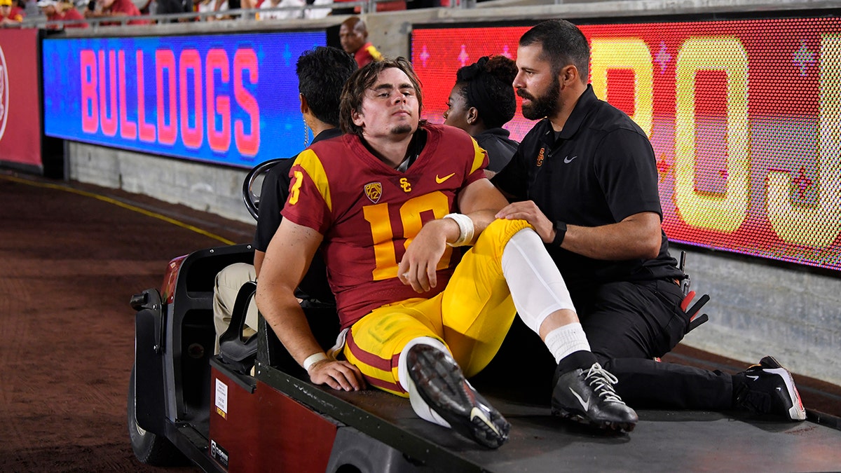 Southern California quarterback JT Daniels is carted off the field after being injured during the first half of an NCAA college football game against Fresno State Saturday, Aug. 31, 2019, in Los Angeles.