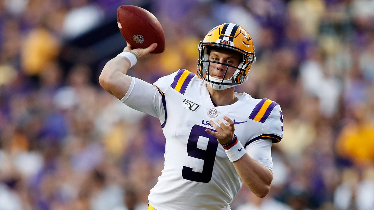 FILE - In this Aug. 31, 2019, file photo, LSU quarterback Joe Burrows (9) throws a pass during the NCAA football team's game against Georgia Southern in Baton Rouge, La. LSU faces Texas this week. Burrow has accounted for 15 touchdowns in LSU’s last three games, including a school record-tying five TDs passes in the season opener, and is the first Tigers quarterback ever with 20 completions in four consecutive games. (AP Photo/Tyler Kaufman, File)