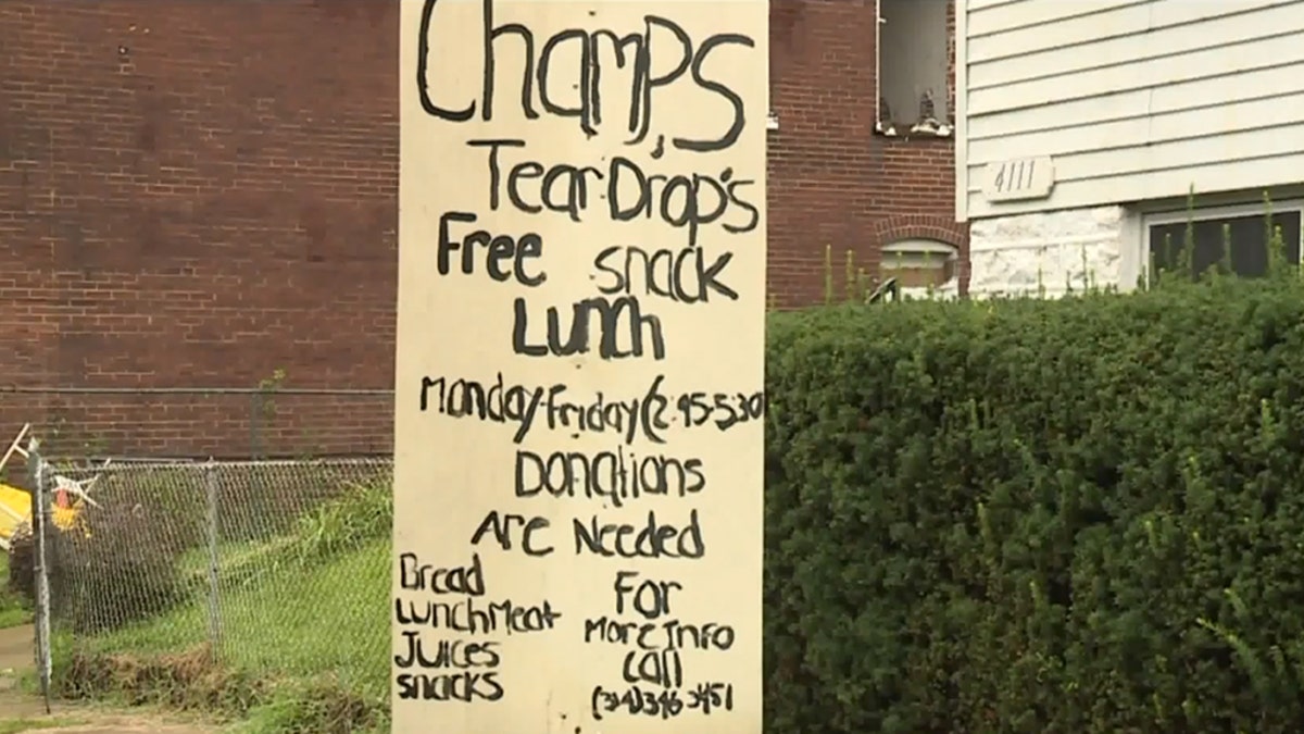 Champale Anderson has a sign outside her home promoting the free snacks from the kids in the neighborhood.