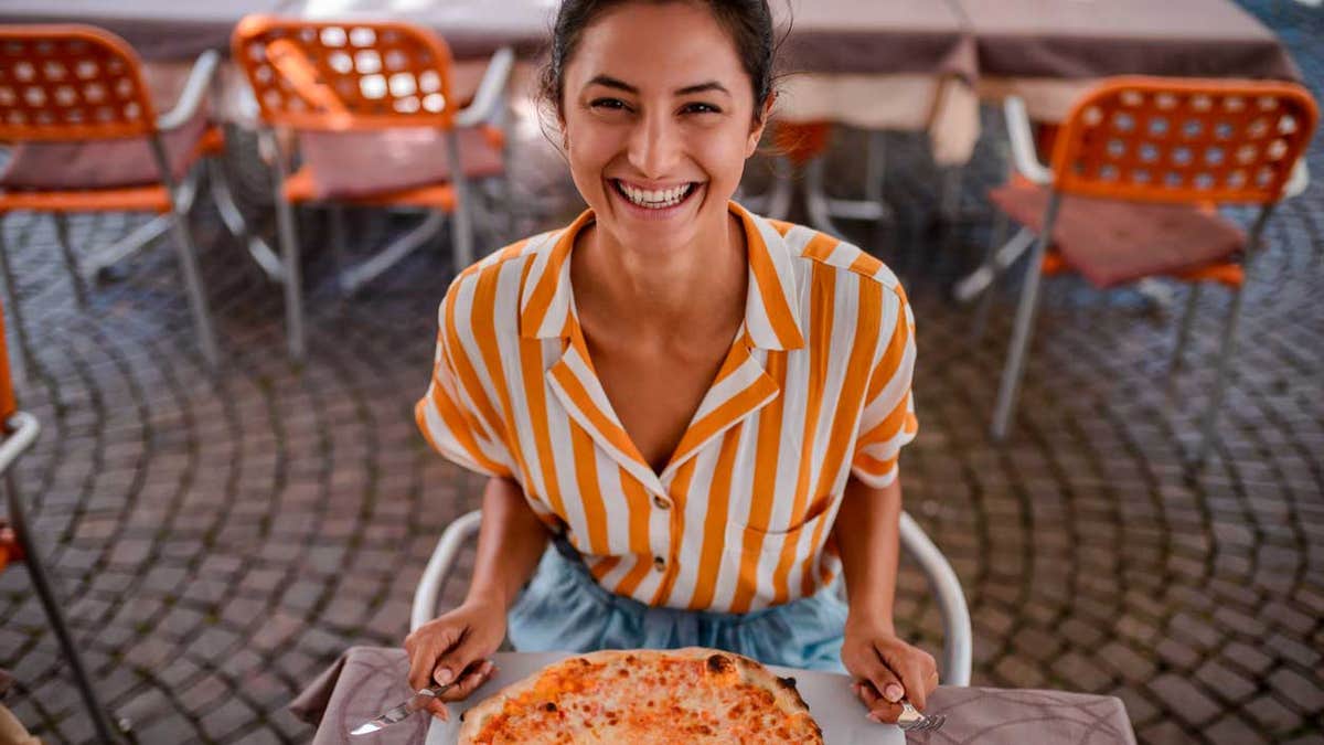 But you can avoid pizza stains by wearing a pizza-hued shirt.