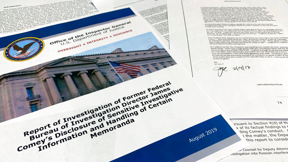 Part of the report from the Office of the Inspector General at the U.S. Justice Department is photographed Thursday, Aug. 29, 2019, in Washington. (AP Photo/Jon Elswick)