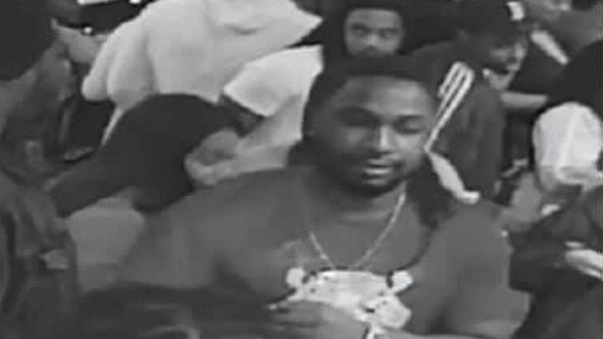 Police are on the hunt for this suspect reportedly captured on video smashing another man in the head with a bowling ball at an event in the Chicago area on Wednesday night, resulting in the victim being placed in a coma.