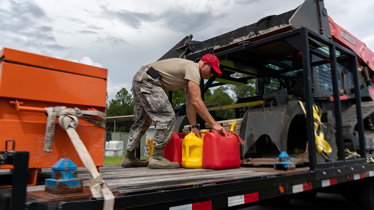 An airman from the Florida National Guard preparing equipment prior to deployment for Hurricane Dorian. (U.S. Air Force photo by Sgt. Christopher Milbrodt)