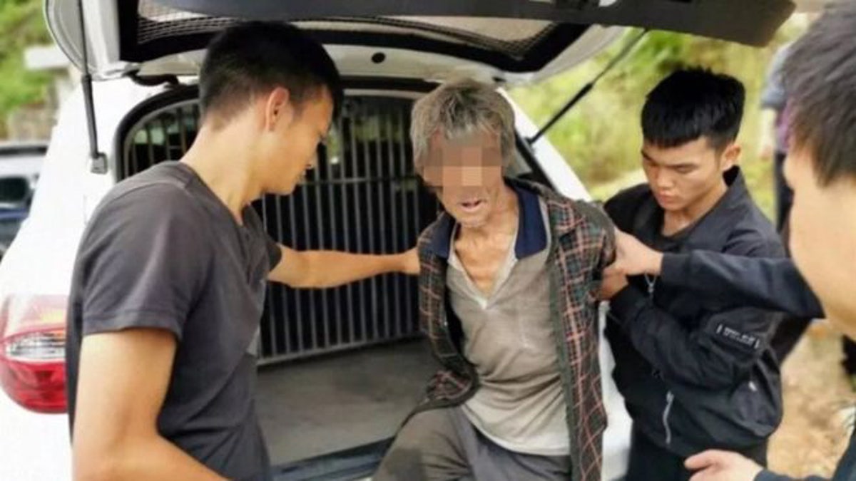Song Jiang, 63, in custody after 17 years on the run.