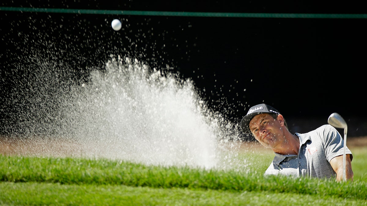 Adam Scott, of Australia, follows his shot out of a bunker onto the seventh green of the Silverado Resort North Course during the first round of the Safeway Open PGA golf tournament Thursday, Sept. 26, 2019, in Napa, Calif. (AP Photo/Eric Risberg)