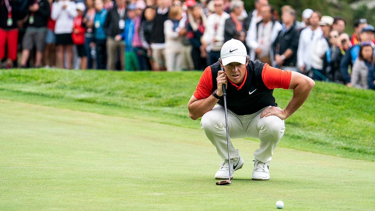 Rory McIlroy of Northern Ireland lines up a putt during the final round the final round of the European Masters golf tournament in Crans-Montana, Switzerland, Sunday, September 1, 2019. (Alexandra Wey/Keystone via AP)