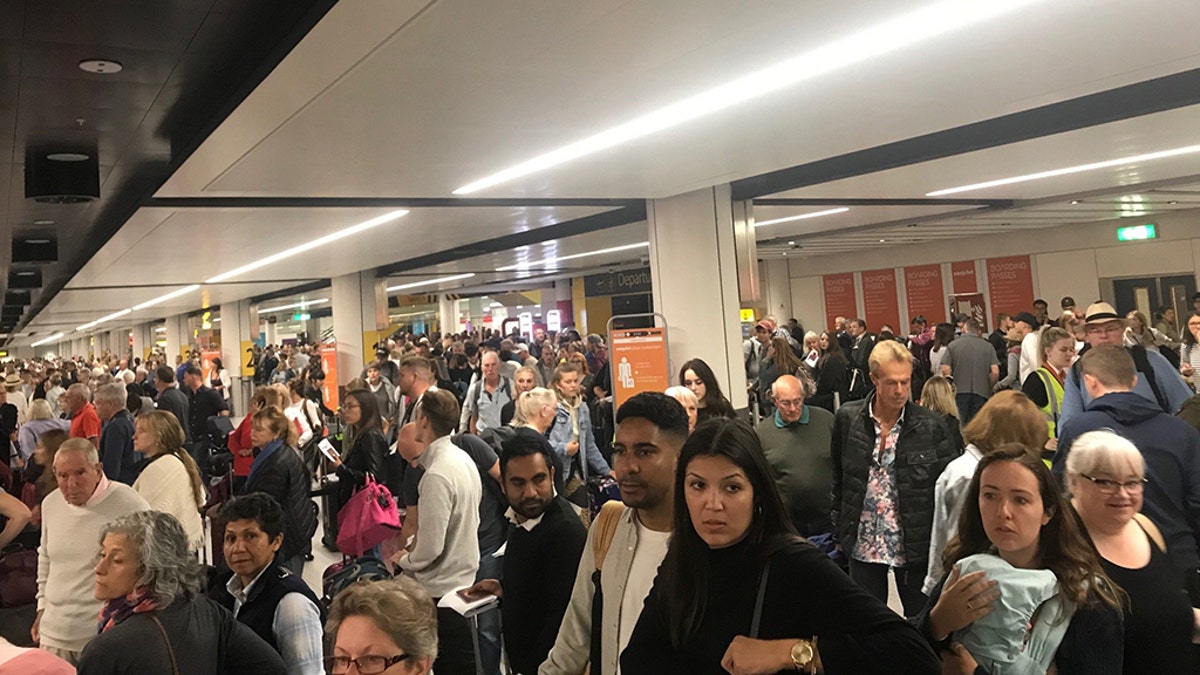 An image of people waiting for their luggage at Gatwick Airport following a “technical issue” that was said to have caused “complete chaos” on Tuesday.