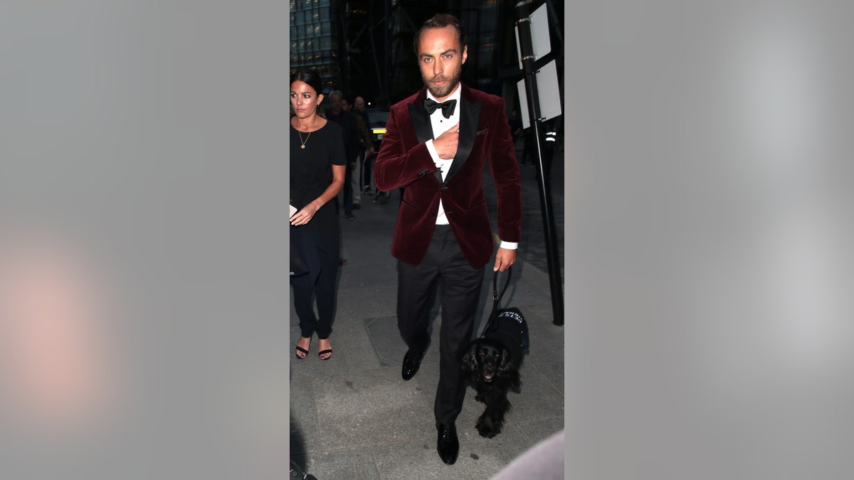 James Middleton attended the GQ Men of the Year Awards in London with his therapy dog, Ella, in tow.