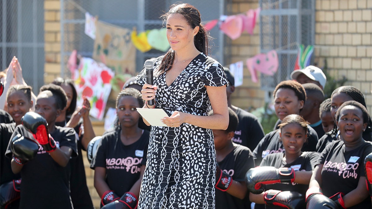 Meghan, Duchess of Sussex makes a speech as she visits a Justice Desk initiative in Nyanga township, with Prince Harry, Duke of Sussex, during their royal tour of South Africa on September 23, 2019, in Cape Town, South Africa. The Justice Desk initiative teaches children about their rights and provides self-defense classes and female empowerment training to young girls in the community.