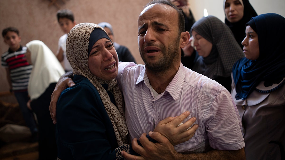 Relatives mourning the death of the 14-year-old Palestinian teenager Saturday.?