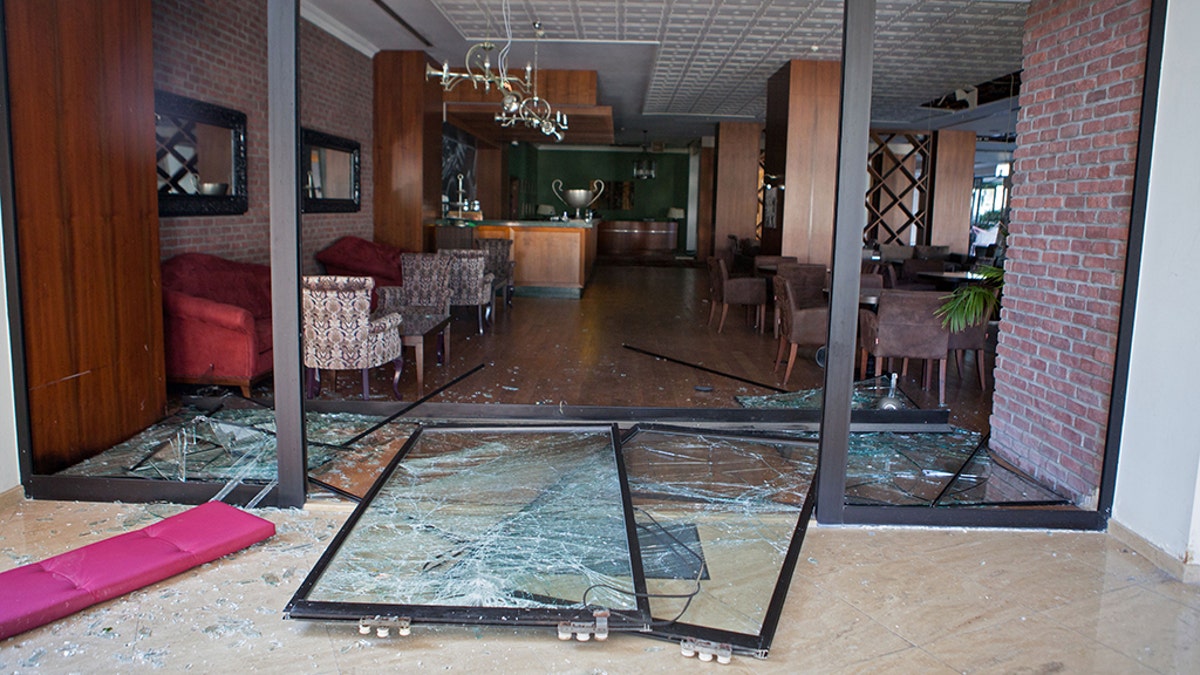 Sept. 12, 2019: Shattered glass doors at the Acapulco hotel in Kyrenia (Girne) in the self-proclaimed Turkish Republic of Northern Cyprus (TRNC) north of the divided Cypriot capital Nicosia, after the building was damaged when a military depot exploded nearby. -
