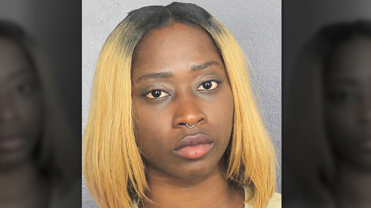 This photo made available by the Broward County Sheriff's Office shows Manouchika Daniels, charged with child neglect. 