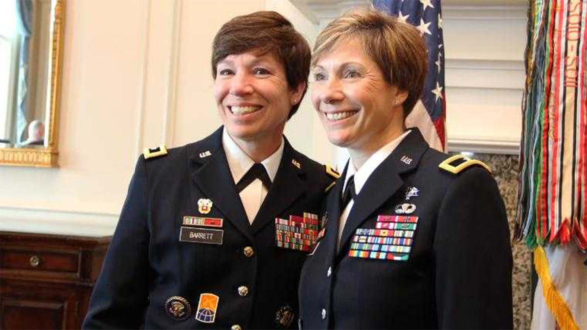 Maj. Gen. Maria Barrett poses with Brig. Gen. Paula Lodi during then Col. Lodi's promotion ceremony at the Army Navy Country Club in Arlington, VA on 12 July 2019.