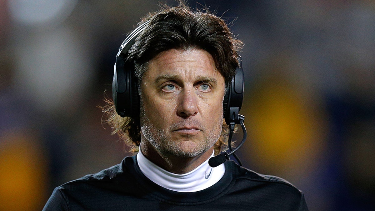 Mike Gundy coaches OK State. (Photo by Jonathan Bachman/Getty Images)