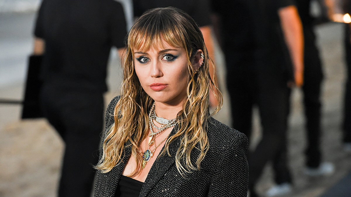 Miley Cyrus at Saint Laurent men's spring-summer 2020 show on June 06, 2019 in Malibu, California.