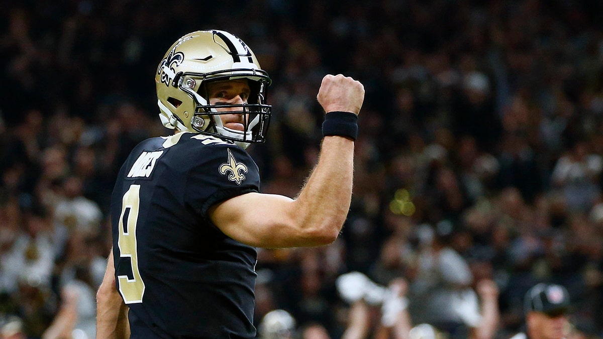 In this Dec. 23, 2018, file photo, New Orleans Saints quarterback Drew Brees reacts after a touchdown carry by running back Alvin Kamara, not pictured, in the first half of an NFL football game against the Pittsburgh Steelers, in New Orleans. (AP Photo/Butch Dill, File)
