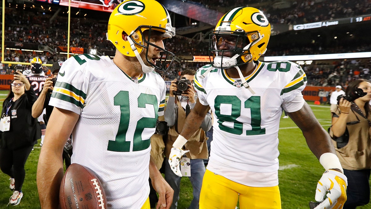 Green Bay Packers' Aaron Rodgers celebrates with Geronimo Allison (81) after an NFL football game against the Chicago Bears Thursday, Sept. 5, 2019, in Chicago. The Packers won 10-3. (AP Photo/Morry Gash)