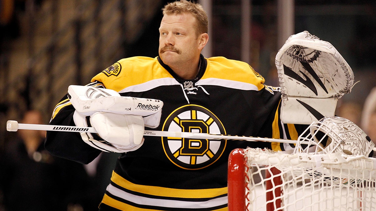 FILE - In this Feb. 4, 2012, file photo, Boston Bruins goalie Tim Thomas is shown before an NHL hockey game agains the Pittsburgh Penguins in Boston. (AP Photo/Winslow Townson, File)