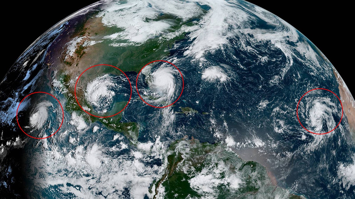 This image, taken on Tuesday, Sept. 3, 2019, shows tropical activity in the Pacific and Atlantic Oceans. Hurricane Juliette can be seen to the left far southwest off Mexico. A new system can be seen in between Juliette and Hurricane Dorian, currently swirling off Florida.