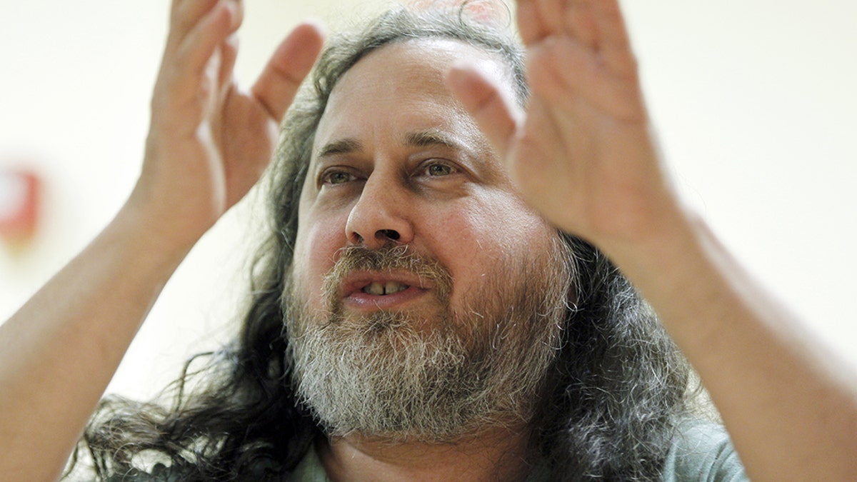 US software freedom activist and computer programmer Richard Stallman speaks with French Green Party "Europe Ecologie les Verts" (EELV)'s candidate for 2012 French presidential election Eva Joly at the EELV's headquarters in Paris on December 15, 2011. (Photo credit should read FRANCOIS GUILLOT/AFP/Getty Images)