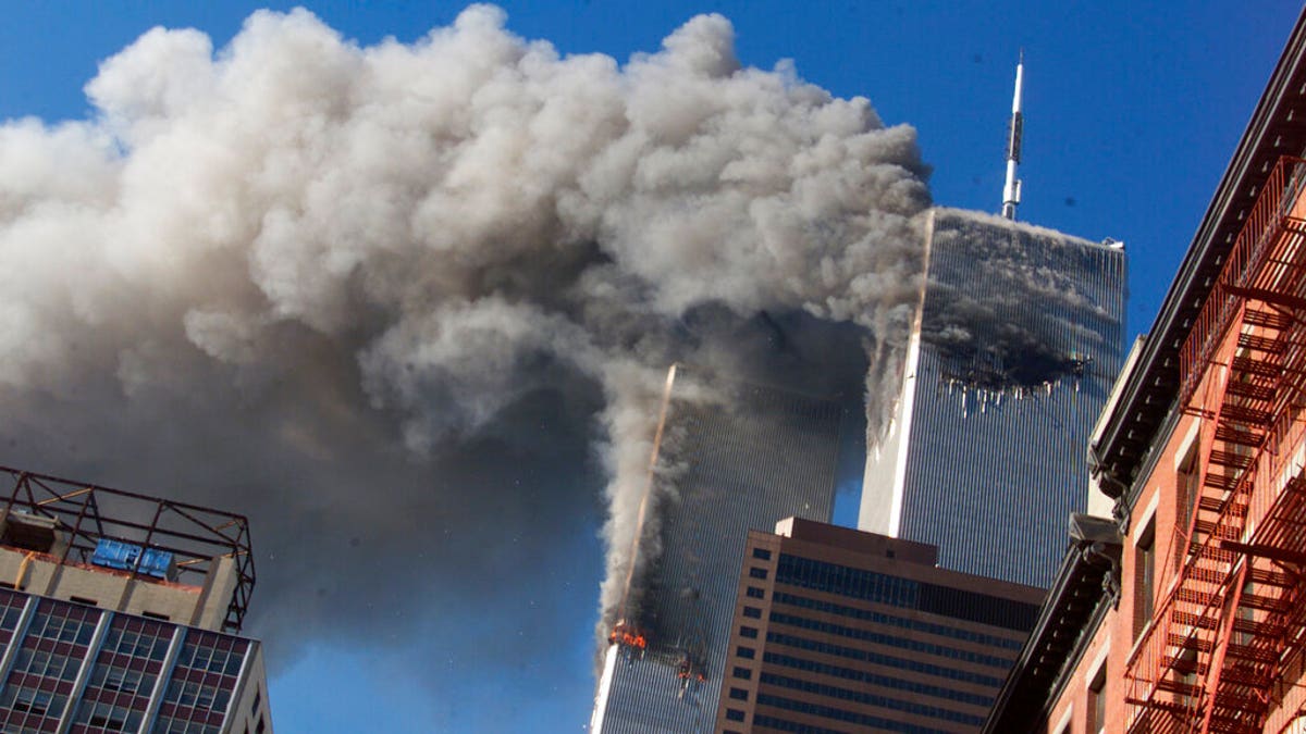 The Sept. 11, 2001 attack on the World Trade Center after hijacked planes crashed into the towers in New York City. Sept. 11 victims’ relatives are greeting the news of President Donald Trump’s now-canceled plan for secret talks with Afghanistan’s Taliban insurgents with mixed feelings. (AP Photo/Richard Drew, File)